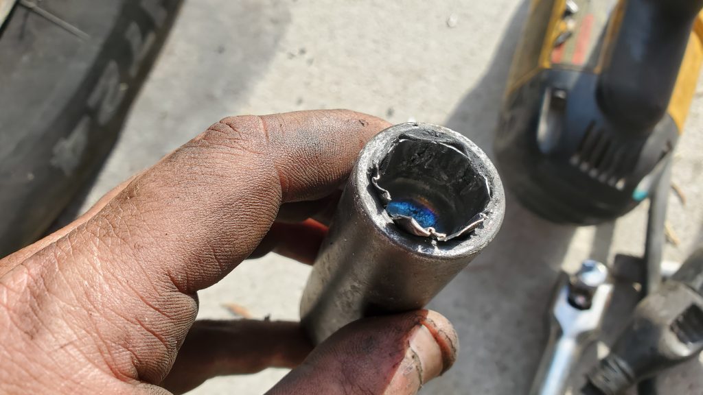 Stripped lug nut removal work photo 1