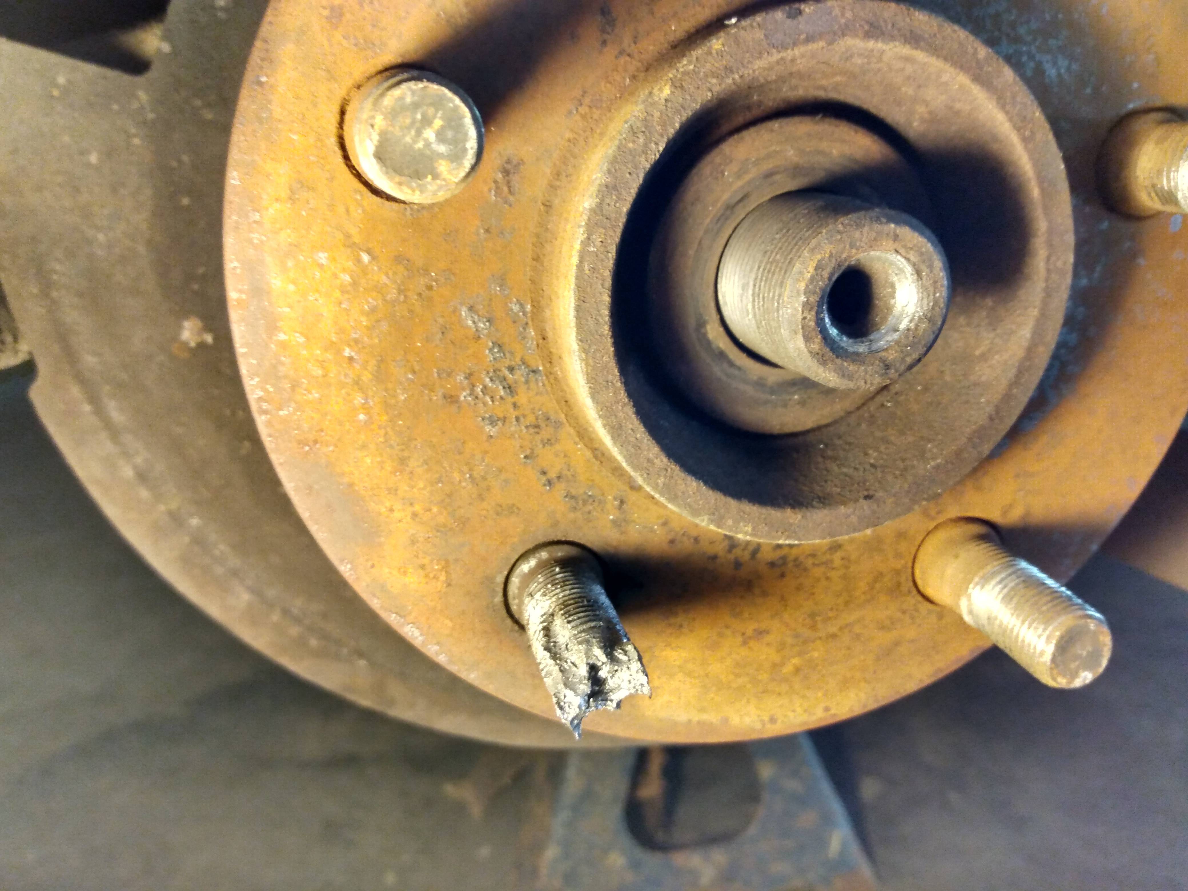 Stripped lug nut removal work photo 4