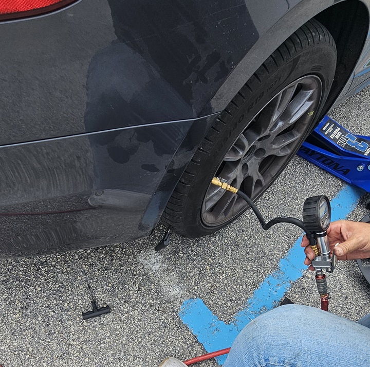 Spare tire installed on vehicle in Miami and Broward Counties